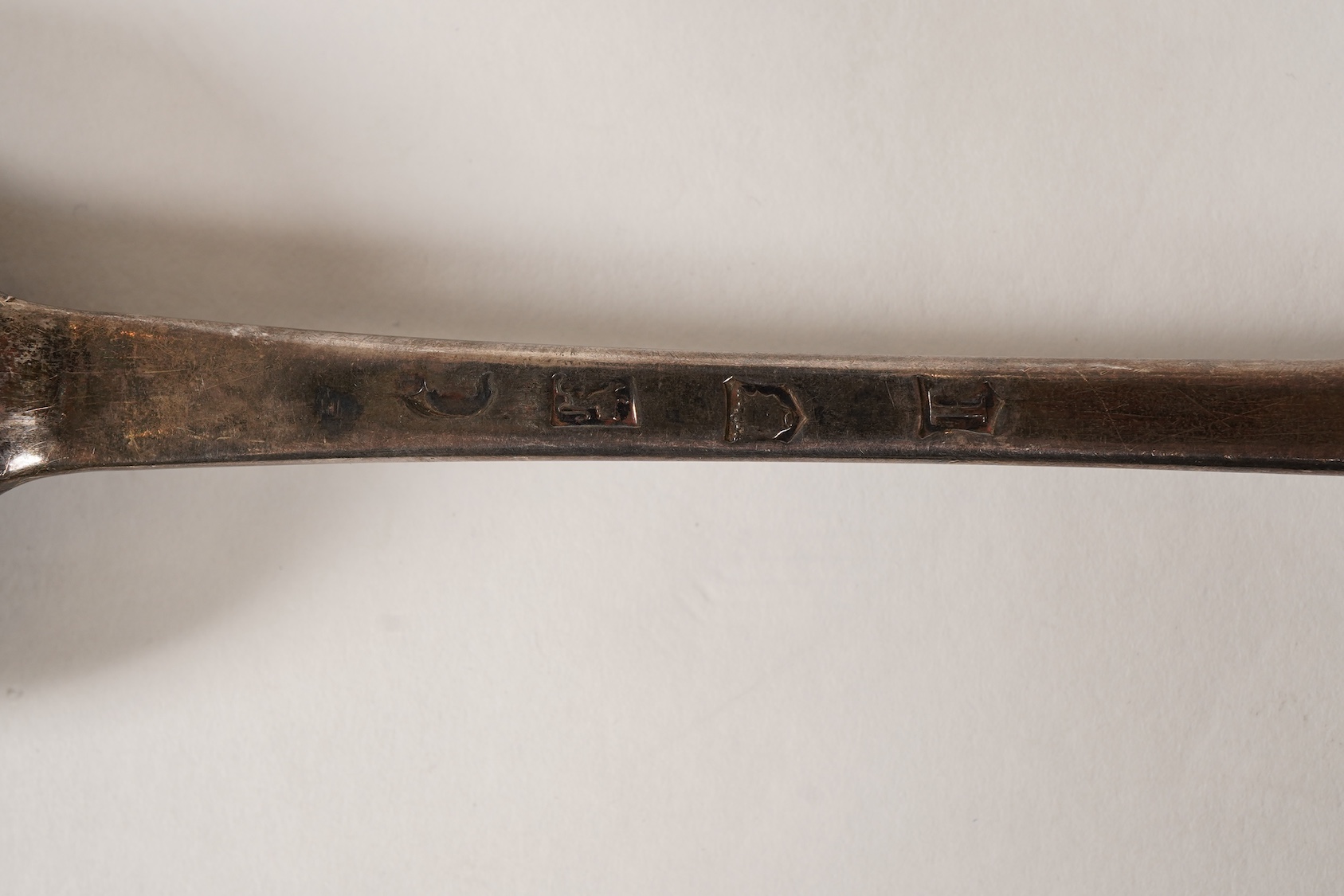 A George II silver Hanoverian pattern large basting or hash spoon